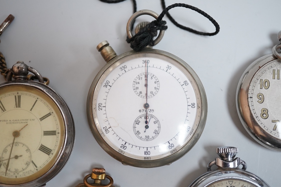 A late 1930's base metal cased Air Ministry spilt second stop watch, case diameter 60mm, together with a Swiss 935 standard open faced pocket watch, one other small white metal pocket watch and three base metal pocket wa